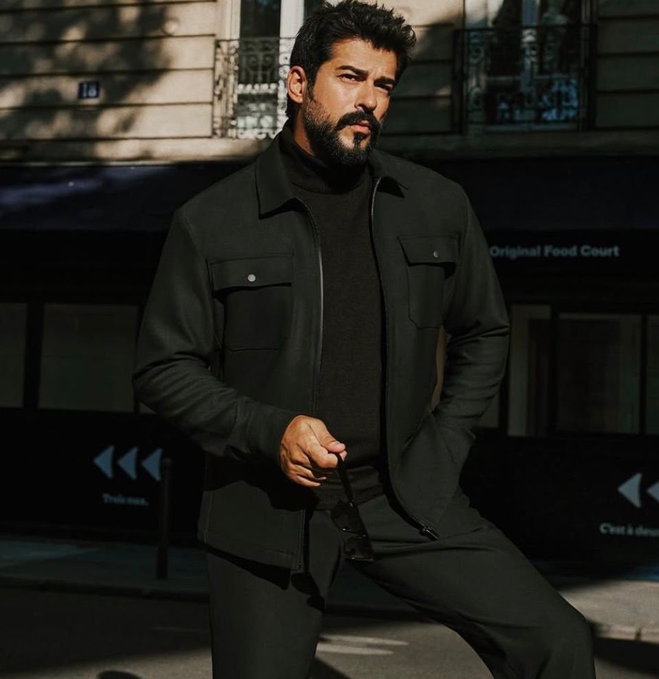 Burak Özçivit movie still — Turkish actor in dramatic film role 